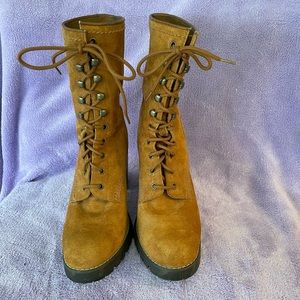 Boots lace-up. Suede like material,  one inch rubber soles, 3 inch heels.